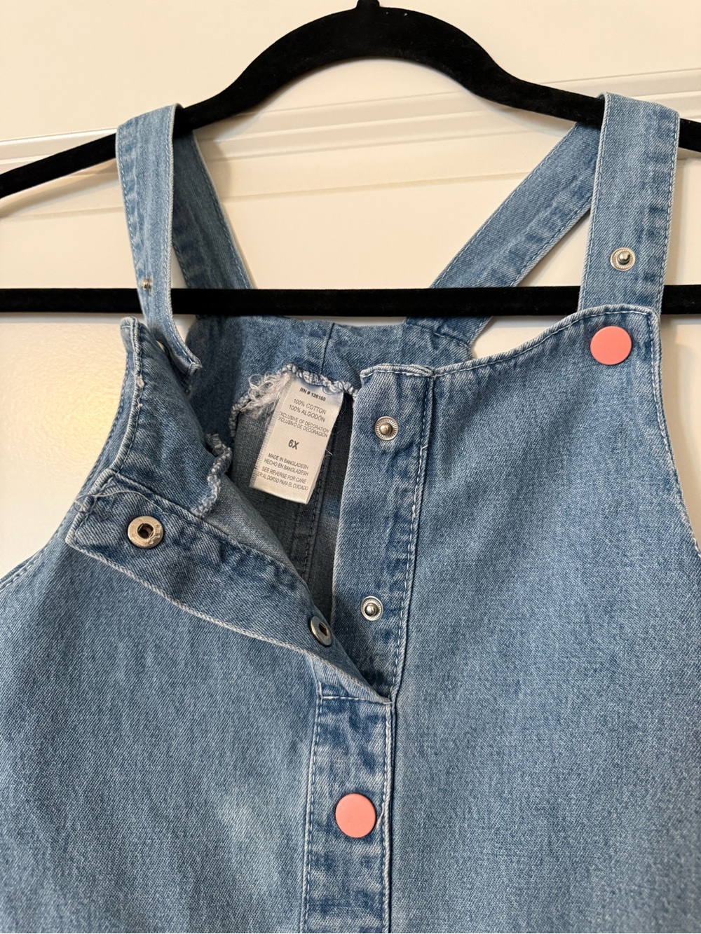 Girls Denim Pinafore Dress with Pink Buttons and Floral Embroidered Pockets - Picture 6 of 7